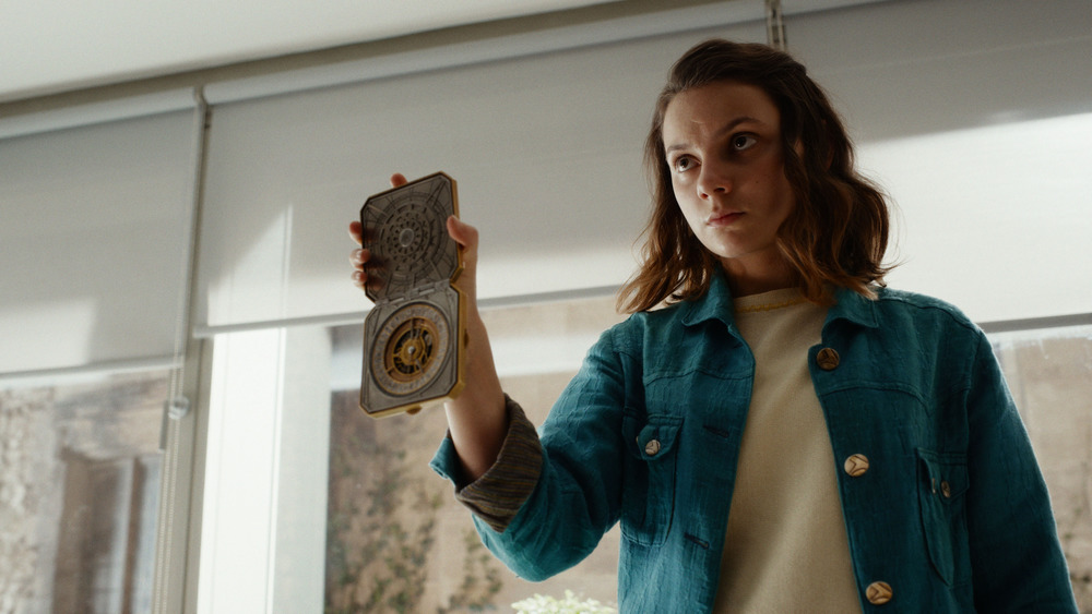 Lyra (Dafne Keen) shows off the alethiometer on His Dark Materials