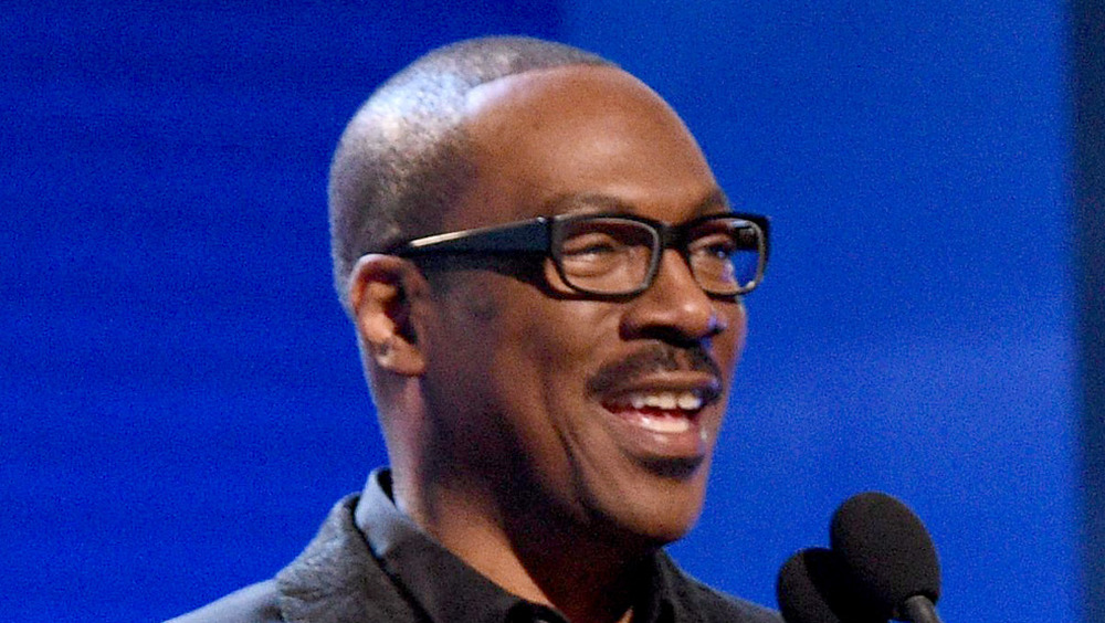 Eddie Murphy accepts award