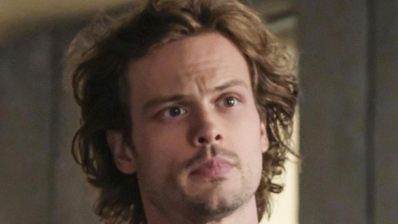 Dr. Reid looking on
