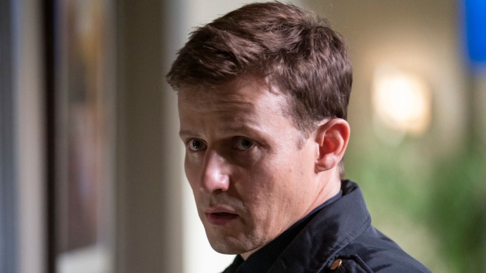 Will Estes wearing cop uniform