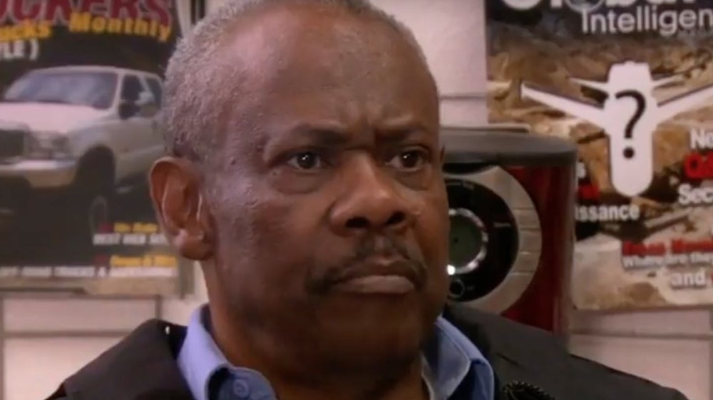 Hugh Dane as Hank the security guard