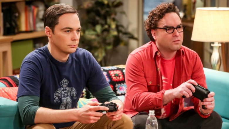 Leonard and Sheldon play video games.