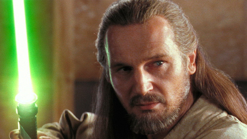 Liam Neeson with lightsaber