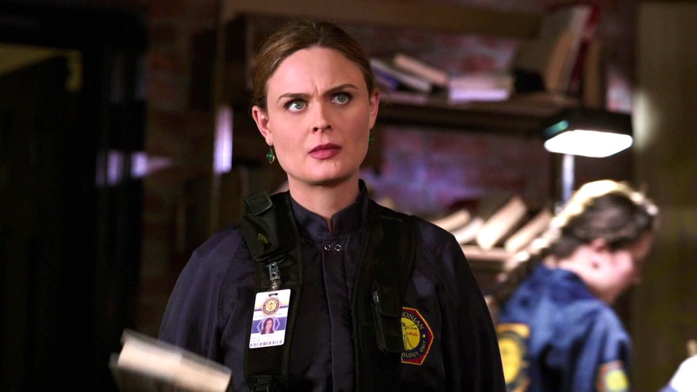 Brennan (Emily Deschanel) at a crime scene on Bones
